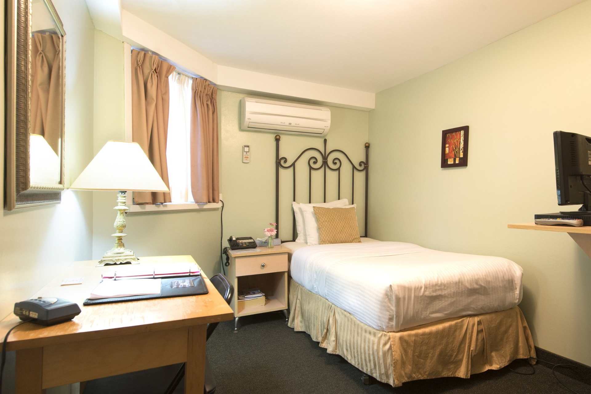 A guest room with a single bed